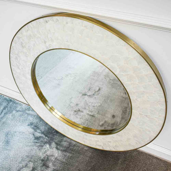 Stainless steel Brushed Gold details along Frame and Inner mirror. 