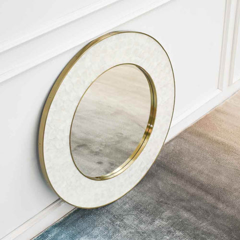 Intricately hand-crafted, Mother-of-Pearl inlay is framed using duo stainless steel frames. This showcases a unique 3-dimensional effect of the wall mirror, making it look more vivid and stunningly beautiful in your living space.