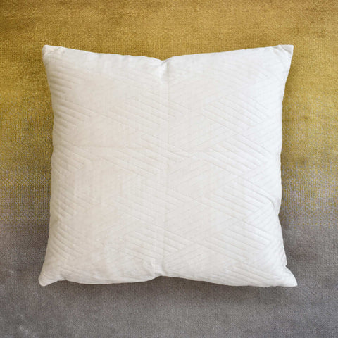 Create a contrasting look in your living room with the Palais embossed beige pillow against the Evka Sun Rug.