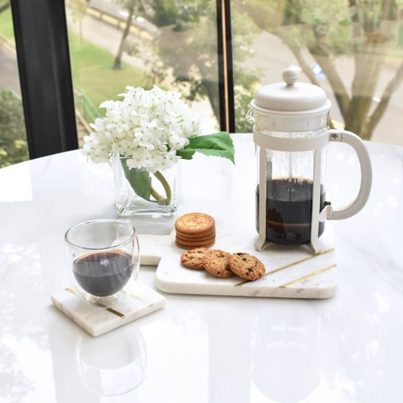 Natural modern luxurious dining serving trays and coasters.