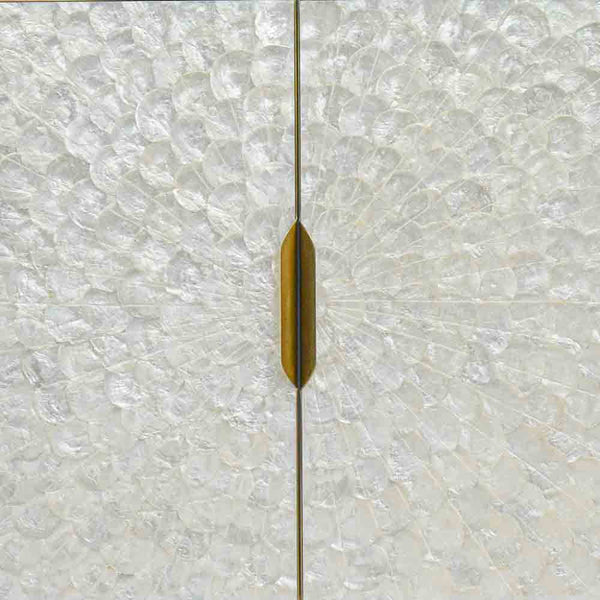 Zoomed in look of Perla door cabinet with Natural Mother-of pearl shell door panels in ivory pearlescent tones.