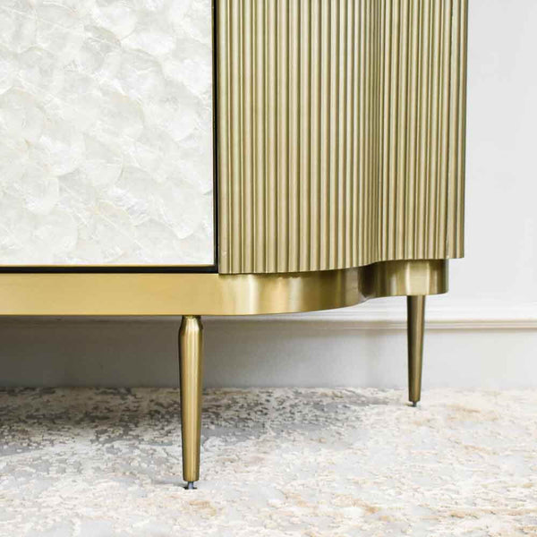 Zoomed in view of the stainless steel brushed gold frame, hand painted gold panels.