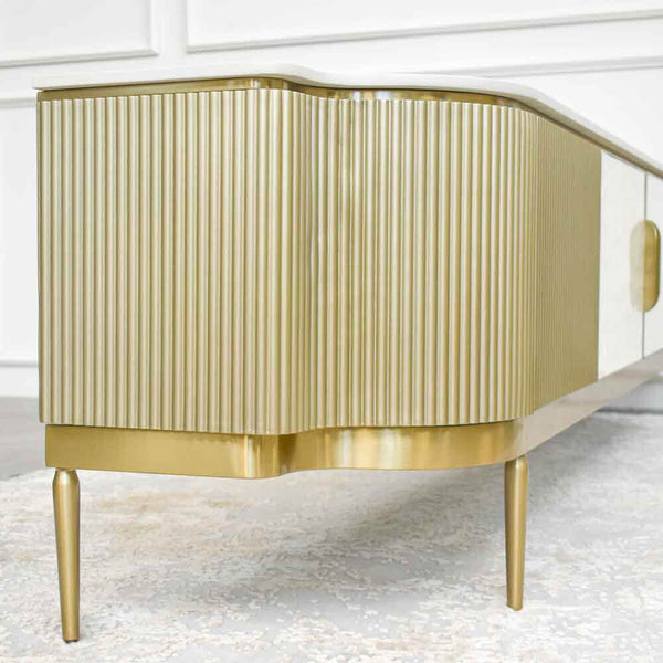 Sleek hand painted gold cabinet panels with brushed stainless steel base.