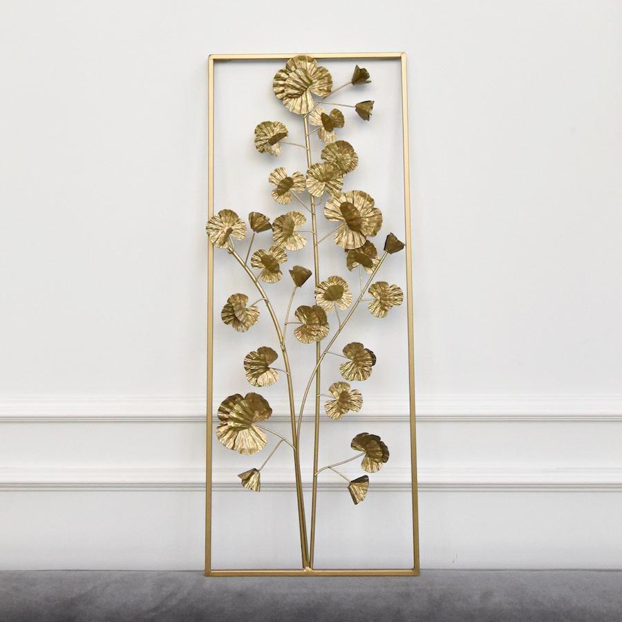 Bring nature indoors with this iron gold-brass finish frame of textured petals. 