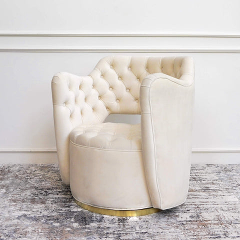 Classic hand tufted seating in Ivory Cream. The Raphael armchair swivels 360 degrees, the high back fully embraces you for maximum back support.