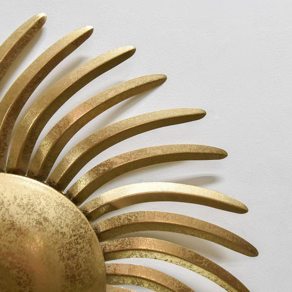 Zoomed in look of the Soleil Sunburst wall decor. 