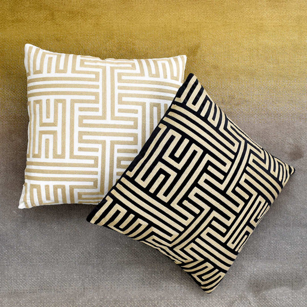 Muse embroiderd cushion, available in Black and Gold, and White and Gold combination.