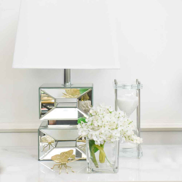 Our all-time popular Temps hourglass features a traditional silhouette with standout acrylic base with metallic accent embellishments.