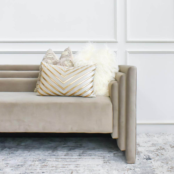 Artistically yet geometrically designed, this gorgeous v-shaped lined design of white and gold brings on a glamour vintage touch and feel to any sofa, armchair or bed.
