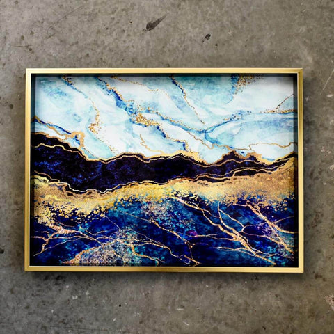 Oceanfront, Rectangular, Gold trimming on edges and artistic abstract marble designs on tray.