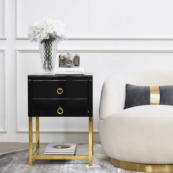 Decorative snow peony in Bernini vase on side table.