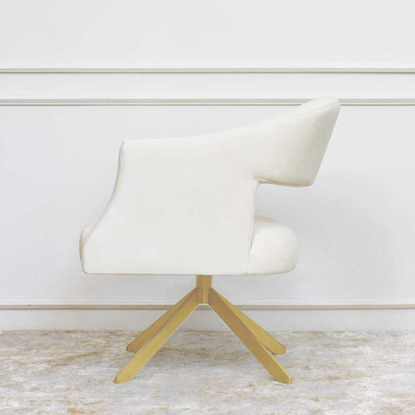 Tourner Armchair in Ivory Cream Velvet and Gold Legs, swivels 360 degrees for better view and access.