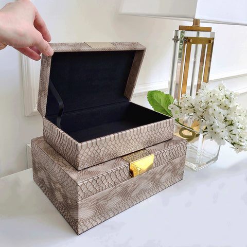 Snakeskin taupe leather boxes stacked from small to large, perfect for console table decor.