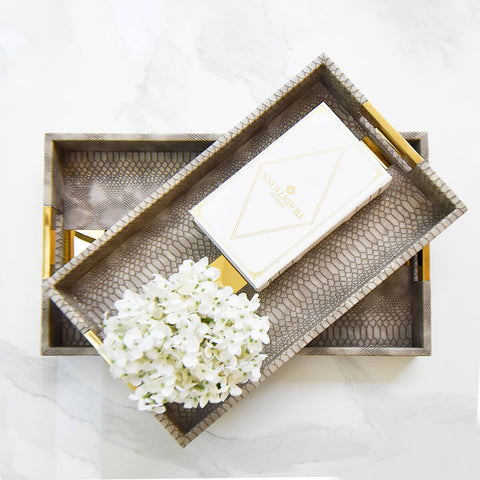 The Tuscan Leather Tray, luxurious and classy, matches perfectly with ivory and gold decor pieces.