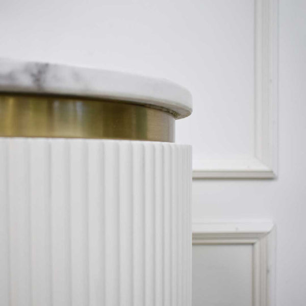 Details in the Verity cabinet, Gold plated stainless steel, solid hardwood, and engineered wood.