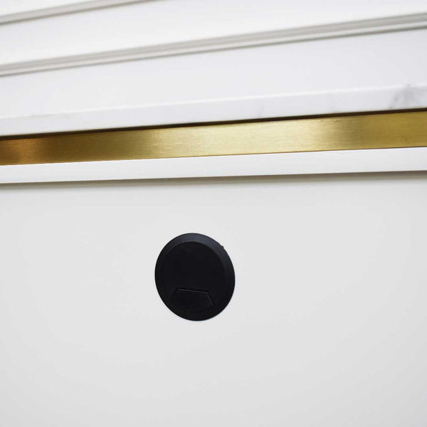 Zoom in of the Brushed smooth stainless steel gold details of the trimmings on the Verity TV sideboard.