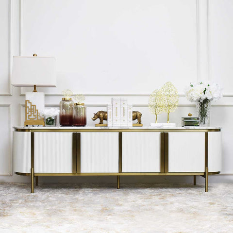 Verity 4-Door Marble TV Console with White and Gold Decor Ideas for Modern Home Design.