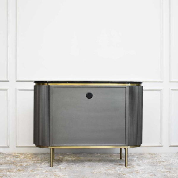 Curved sides makes the Verity cabinet looks shorter and more space saving.