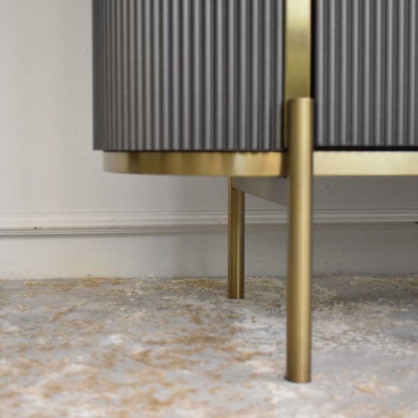 Gold details on feet and black panels on body.